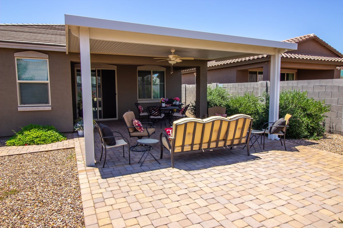 Rear yard Patio Furniture Covered By Pergola