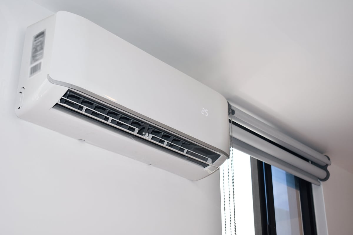 Mini split air conditioning system installed on the wall