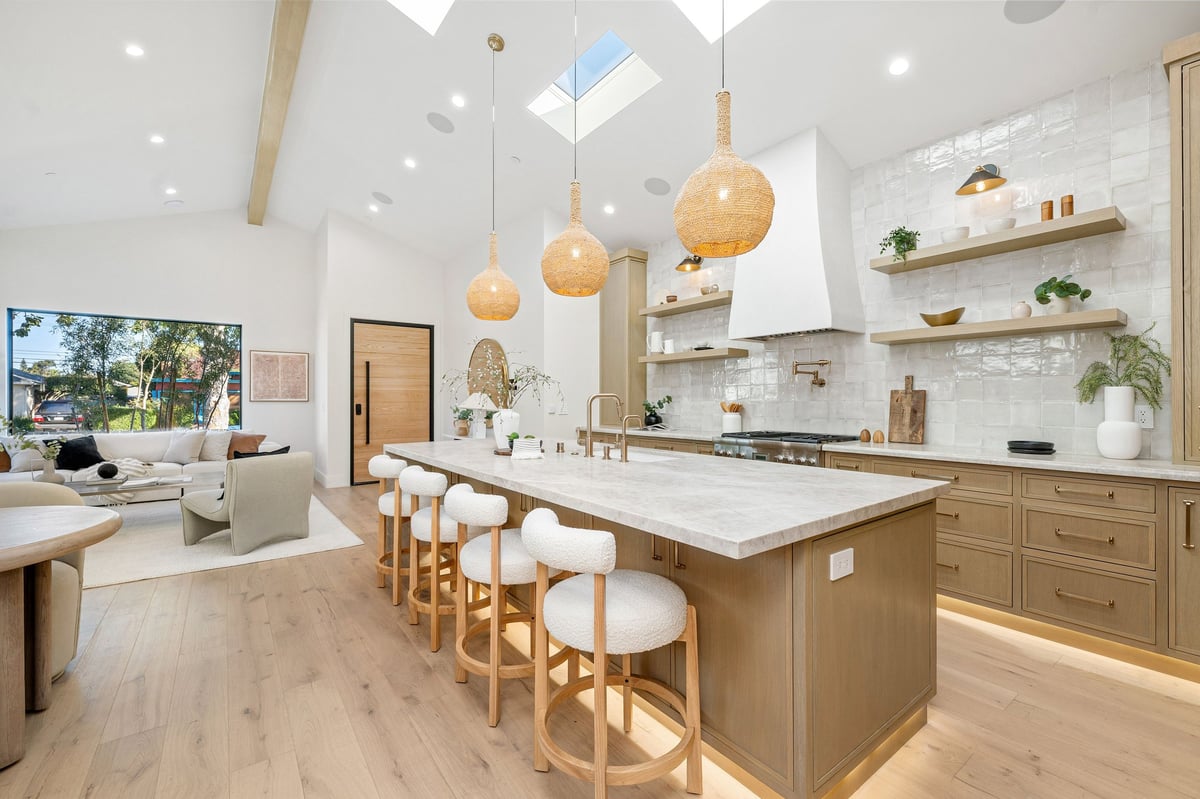 House Cleaning The Woodlands TX sparkling clean modern kitchen with wooden cabinets and island ready for move-in