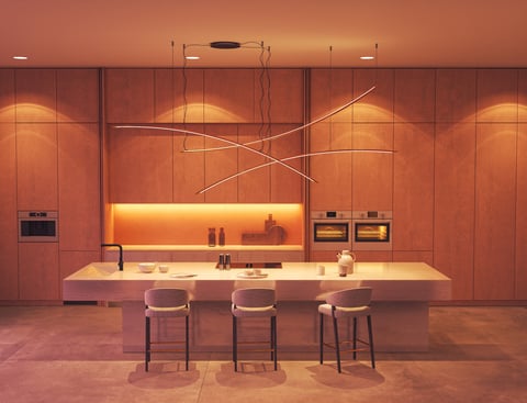 Modern kitchen design featuring a sleek stone island, built in appliances, artistic pendant lights, and seamless wooden cabinetry.