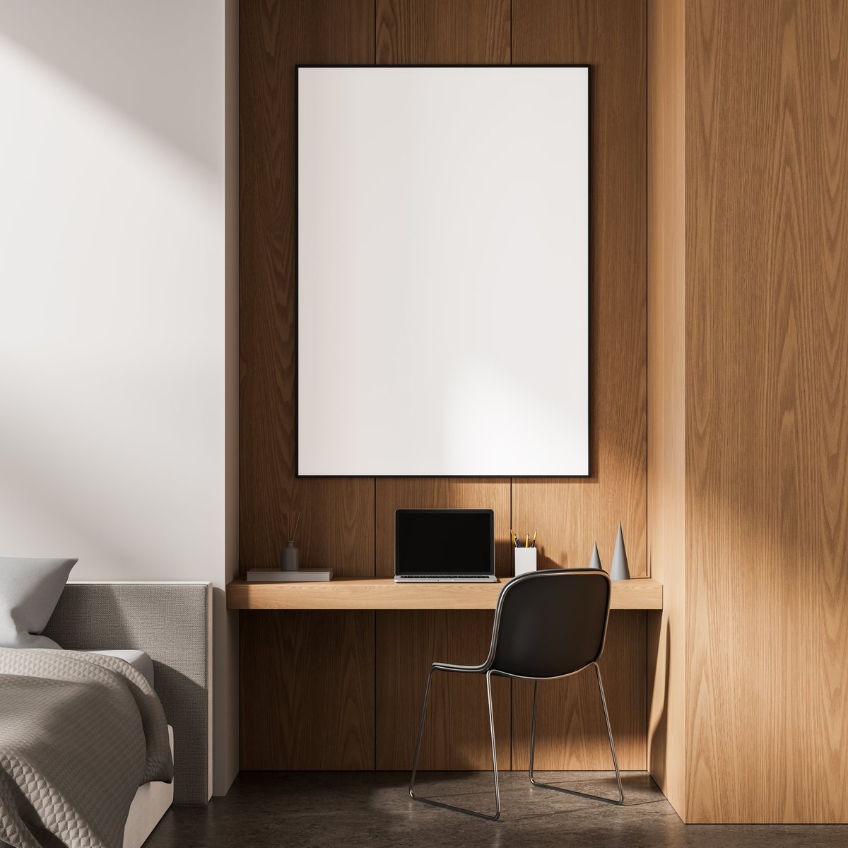 Modern bedroom interior with a minimalist built-in wooden desk, laptop, stylish chair, and blank vertical frame on wooden panel wall. 3D Rendering