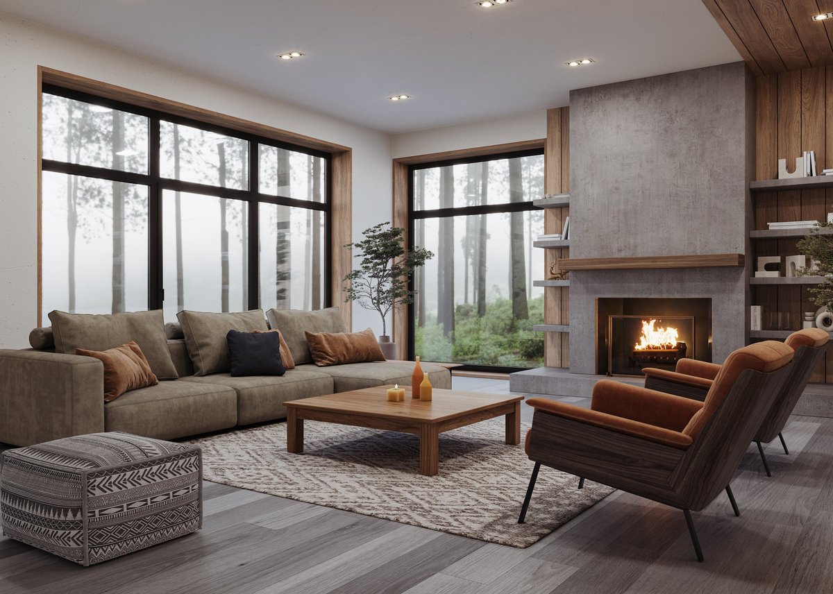 Cozy modern living room with natural wood accents, soft neutral furniture, and a minimalist concrete fireplace. Surrounded by large windows offering a serene forest view