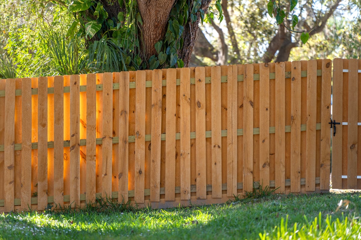 Wooden plank fence in Florida backyard