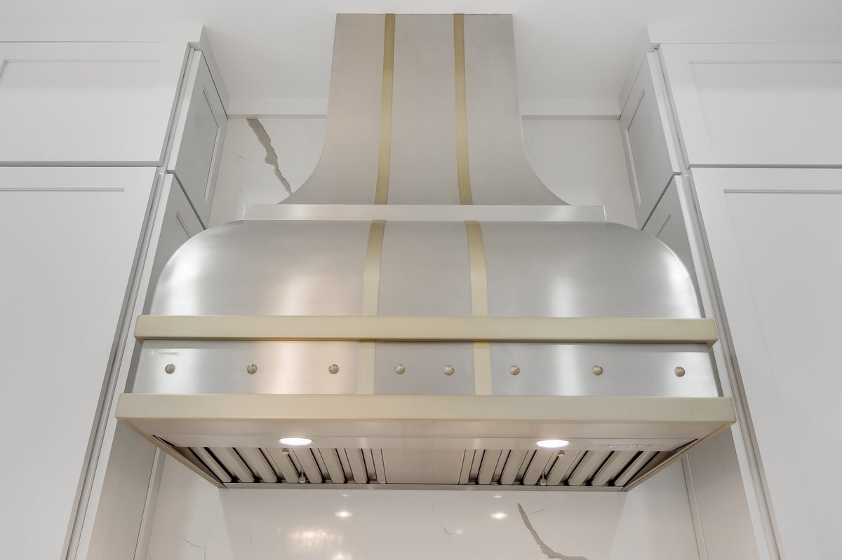 A large, custom kitchen vent hood