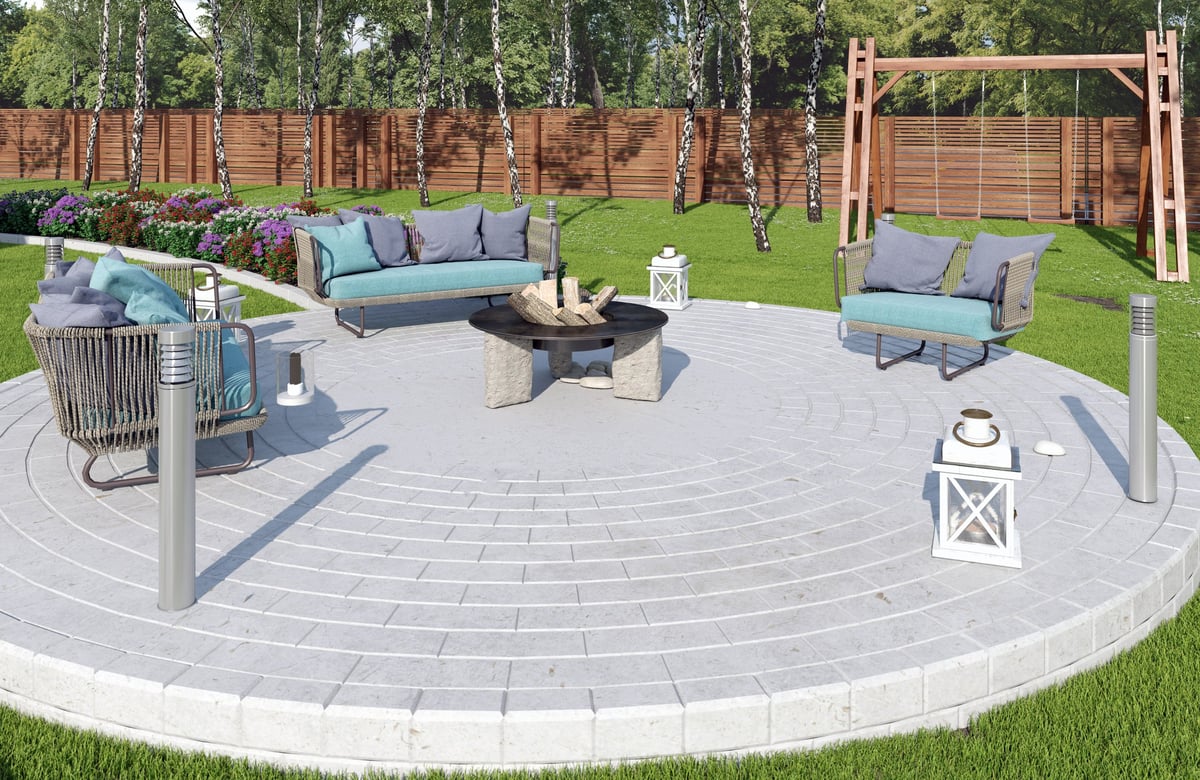 A 3D render of a landscaped backyard featuring a circular stone patio, teal outdoor furniture, a fire pit, green lawn, and a wooden swing set.
